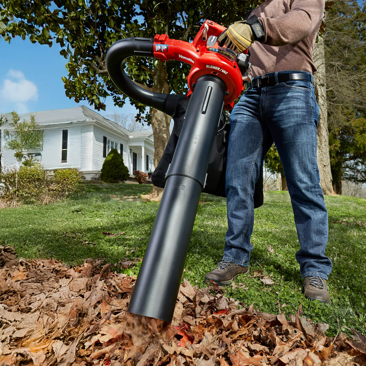 26cc Gas Handheld Blower Vacuuming leaves 